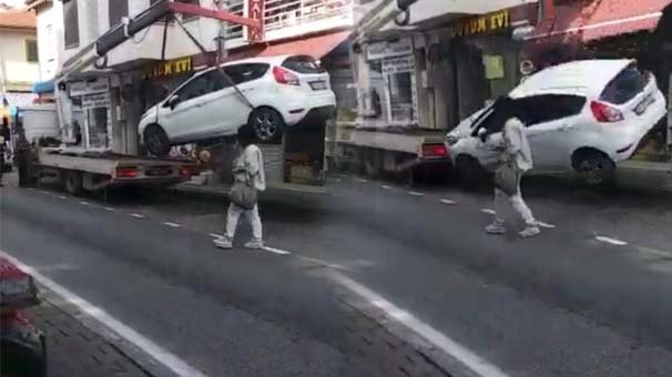 Araç sahibini çileden çıkaran olay! Halat birden kopunca...