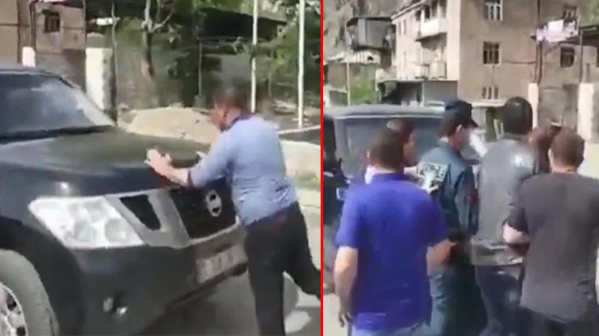 Aracının önünü kesen öfkeli kalabalık 