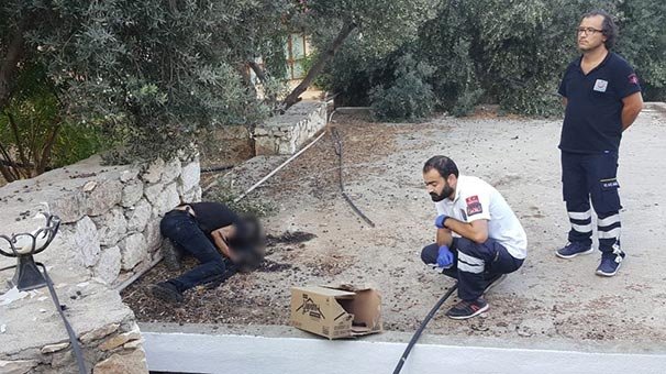 Tuvaletin çatısında elleri ve yüzü yanmış ceset bulundu